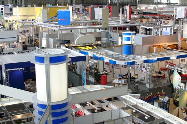 bigstock-hannover-fair-germany-25963766 Manufacturers Rep Using Sales Software on Tablet