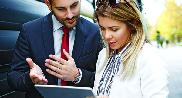 Manufacturers Rep Using Sales Software on Tablet