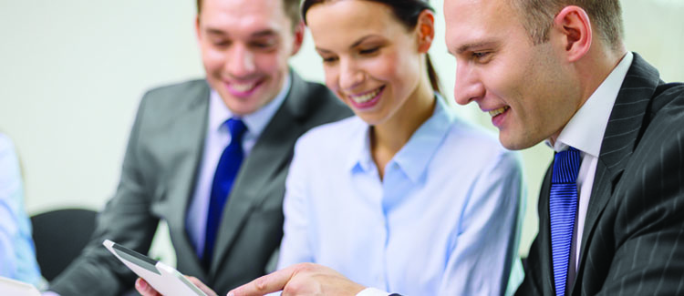Marketing Team Using Sales Enablement Platform on Tablet